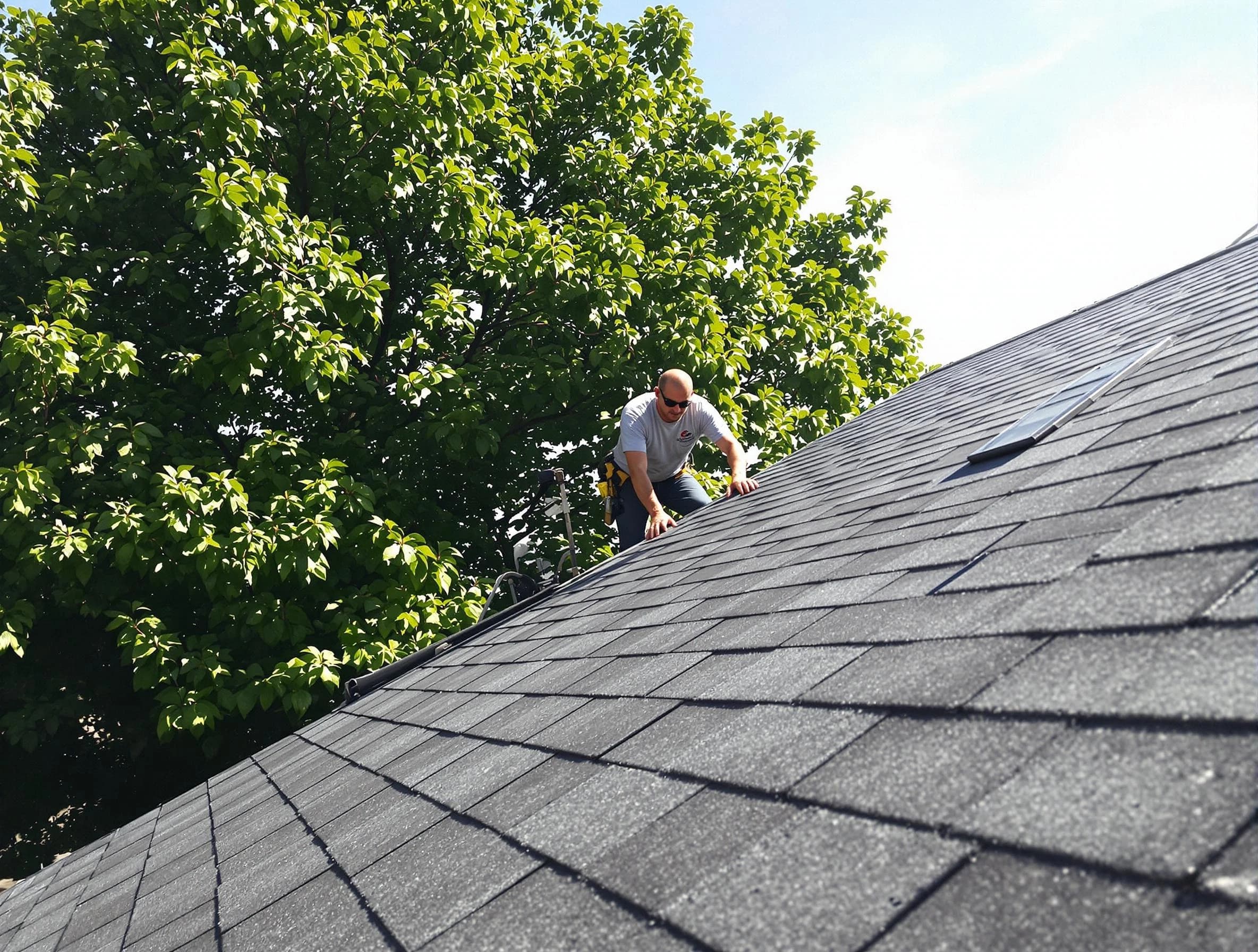 Certified roofers from Avon Roofing Company working in Avon, OH